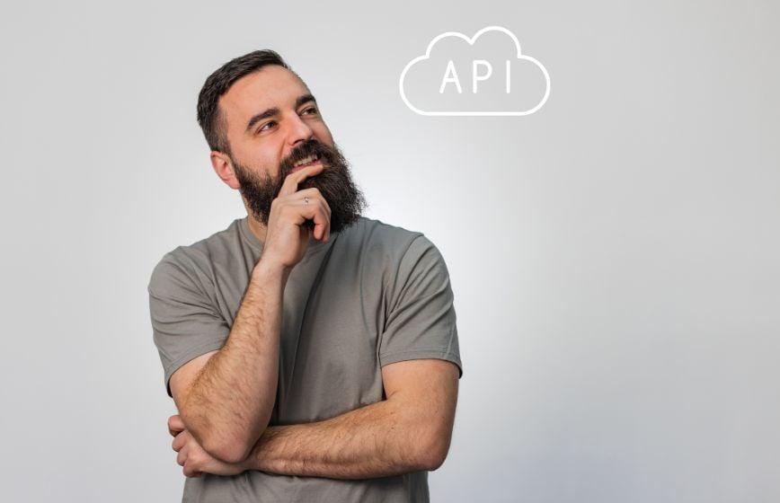 Man thinking with an API cloud icon above him.